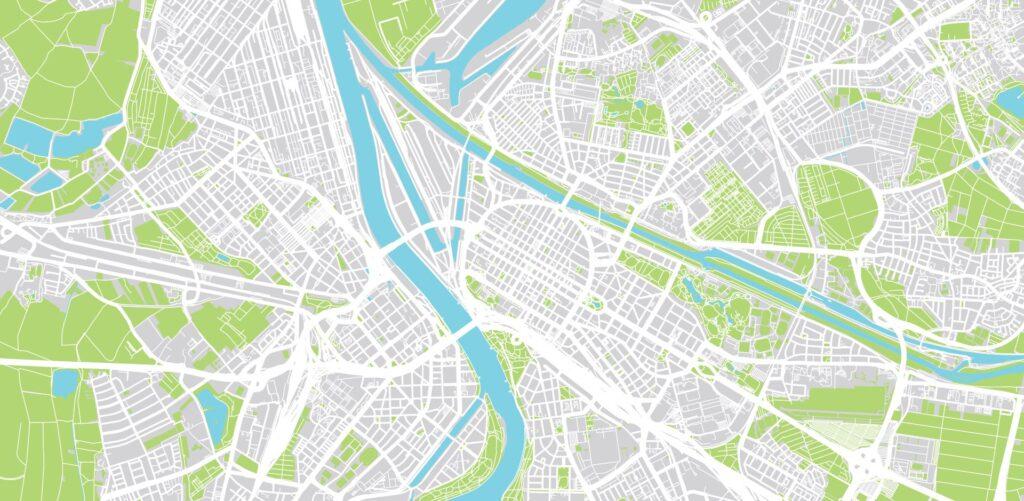 Stadtplan von Mannheim mit markierten Grünflächen und Straßen.